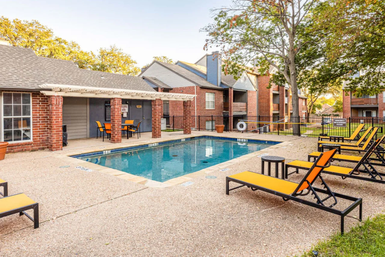 Bradford on the Park — pool area, fire pit, or covered BBQ area showing renovated amenity spaces.